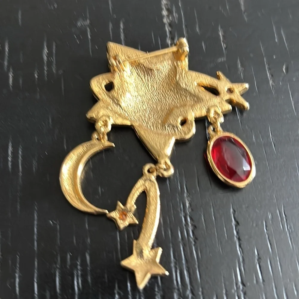 Gold Celestial Dangle Star and Moon Brooch with Red Gemstone​